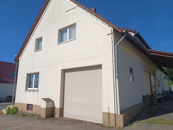 Rentables Mehrfamilienhaus mit vielen Möglichkeiten – Giebelseite S/W