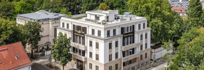 8 konut birimi, ticari alan ve garajlardan oluşan çok yönlü yatırım fırsatı