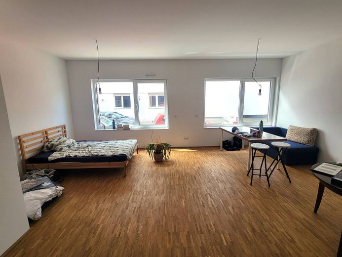 Perfekt für Singles: 1-Zimmer-Apartment mit EBK im Neubauquartier "Großherzog Friedrich Höfe" – Wohn-und Schlafbereich