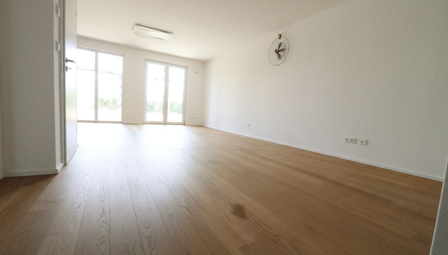 WRS Immobilien - Niederdorfelden - casa a schiera di testa come nuova con buone dotazioni + garage – Wohnzimmer