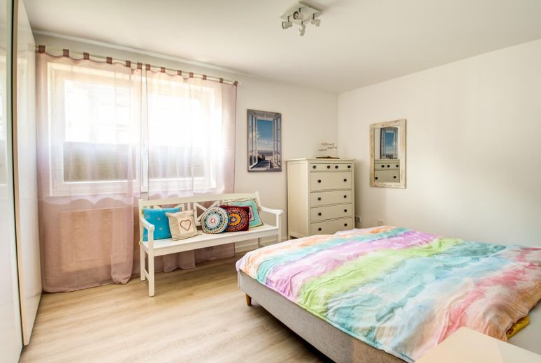 Central, accessible comfort apartment with Baltic Sea views – Schlafzimmer