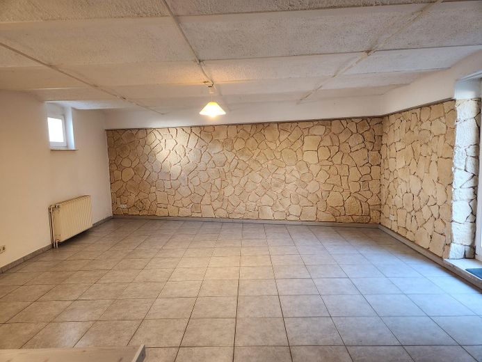 Vollvermietetes Gebäude - DHH als Eigennutz möglich - mit Nebengebäude und neuer Garage – WZ, App. UG