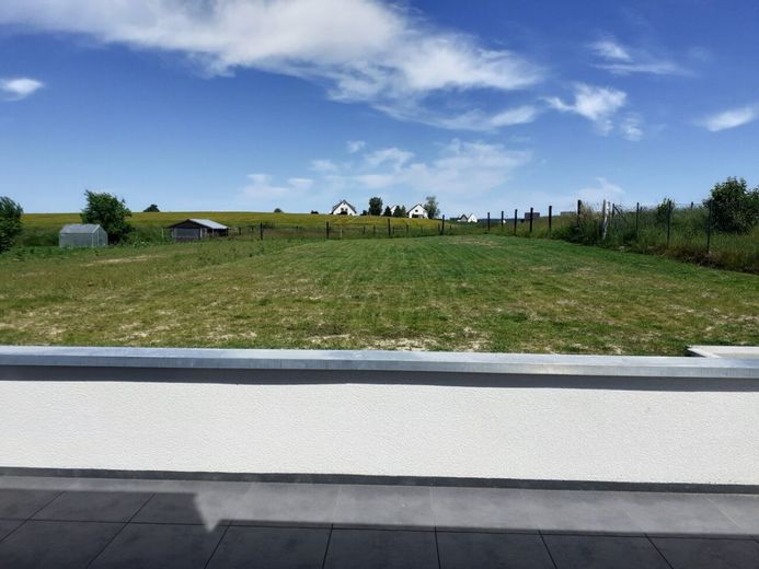 Moderne Doppelhaushälfte mit großem Garten, Weitblick &amp; Carport in Werste – Ausblick