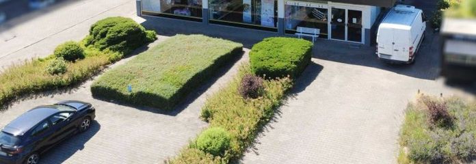 Modernes Wohn- und Geschäftshaus auf 2.000 m² Grundstück – Business trifft Wohnen im Zentrum Bönens