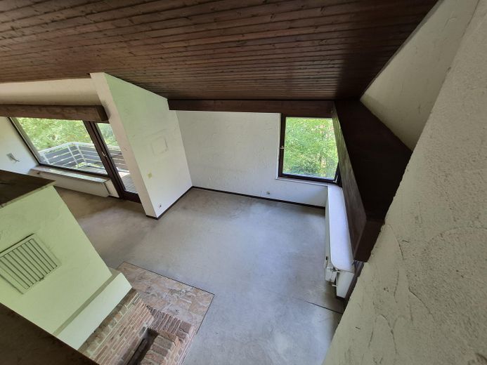 Wohnen im Wald-Panorama: Lichtdurchflutetes Architekten-Juwel in Partenstein – Offenes Wohnkonzept
