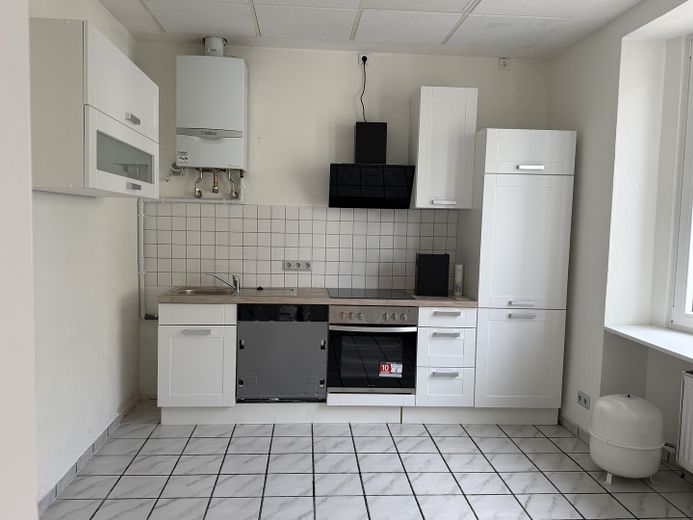 Ruhige modernisierte 2-Zimmerwohnung in Gummersbach Stadtmitte – Küche neu 