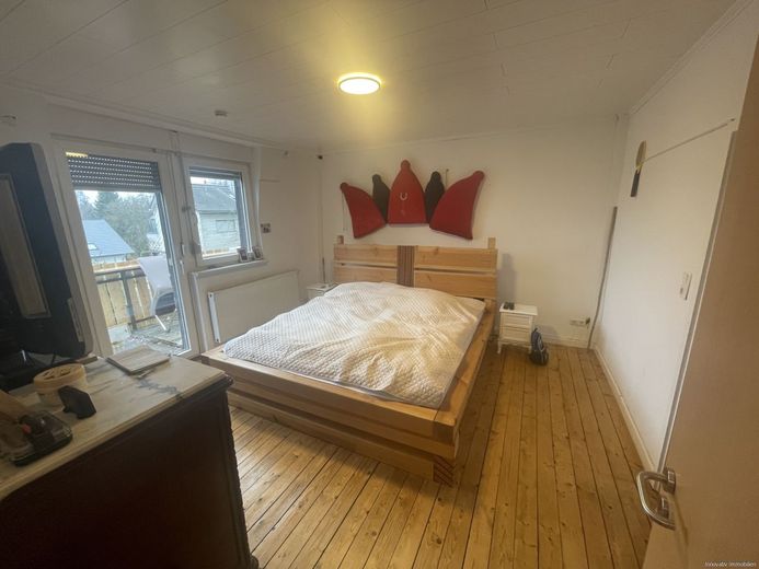 Modernisiertes Einfamilienhaus in idyllischer und ruhiger Lage von Dudweiler – Raum 2 OG