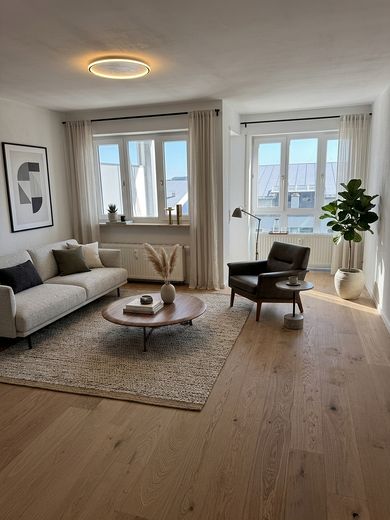 Modern and commission-free apartment on Eselsberg with south-facing balcony and near the university – Wohnzimmer möbliert mit KI