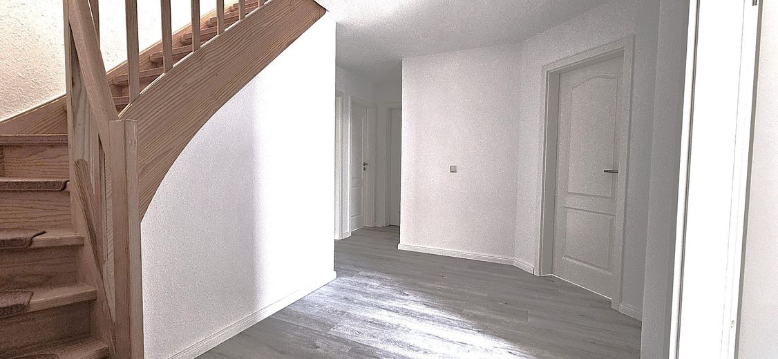 Sunny maisonette apartment in Elstorf - green, quiet and central – mit Treppenflur