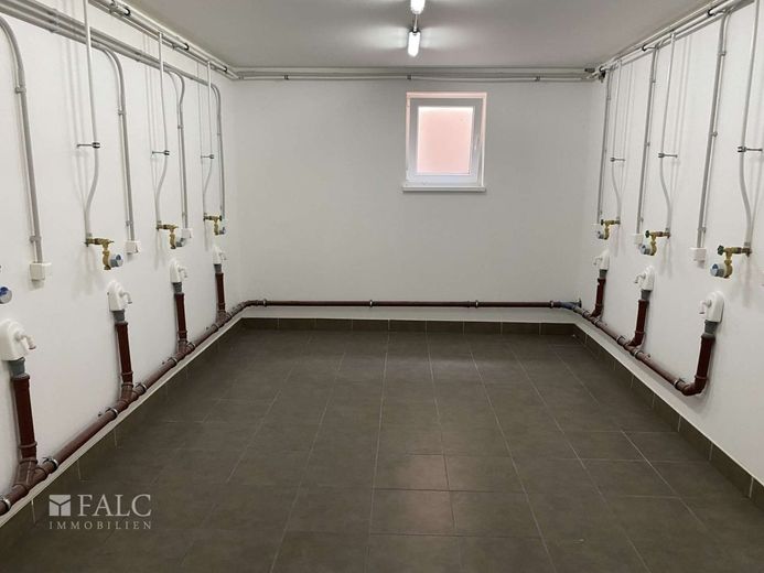 Hochwertige 2-Zimmer-EG-Wohnung mit Terrasse - Langfristig vermietet &amp; barrierefrei zu verkaufen! – Waschküche