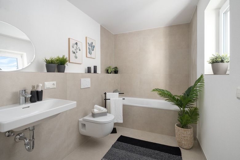 Neubau in massiver Bauweise- DHH mit Dachterrasse in ruhiger Lage – Bad im OG