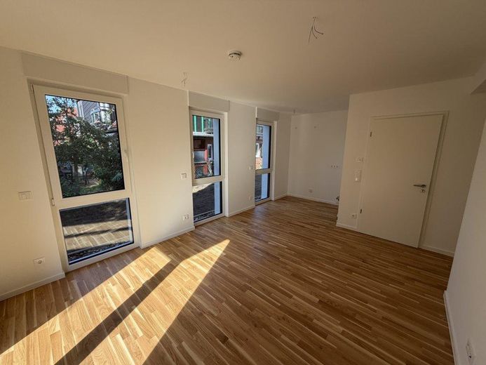 Jouw nieuwe thuis in het groen: nieuwbouwappartement met 2 kamers en tuin – Wohn/Küche