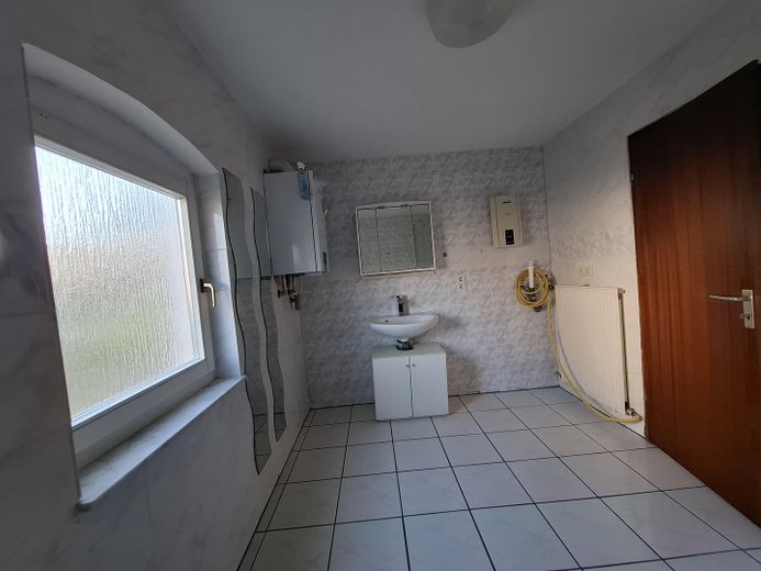 NIEDROGIE MIESZKANIE W SPOKOJNEJ OKOLICY Z TARASEM!!! – Badezimmer