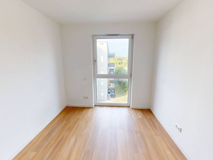 Oasi di benessere inondata di luce di 83 m²: moderno appartamento di 3 locali con balcone a Villingen – Ansicht II: Schlafzimmer II
