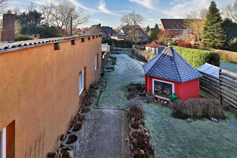 Mehrfamilienhaus mit Ausbaureserve in zentraler Lage von Lunden – Garten