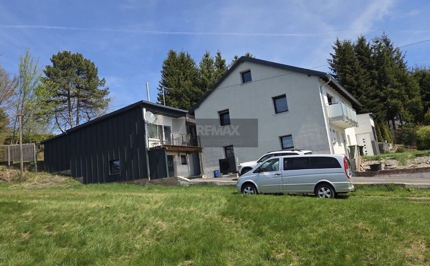 Modernisiertes
Einfamilienhaus mit Wärmepumpe, PV, Garage, Stellplätze und  Einliegerwohnung – Bild 3