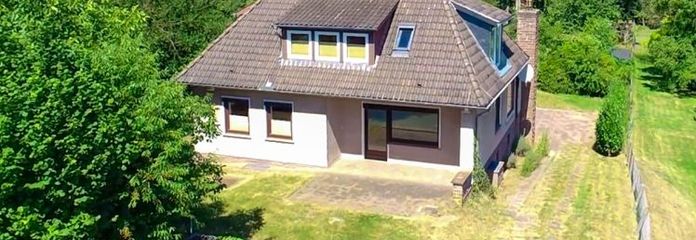 Architektenhaus zentral in Walsrode – 3.345 m² Waldrandlage mit Bachlauf & Obstbäumen