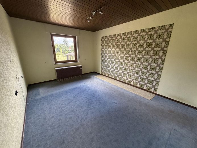 Löhne-Mennighüffen’de büyük bahçeli tek- veya iki ailelik ev – Schlafzimmer 2 EG