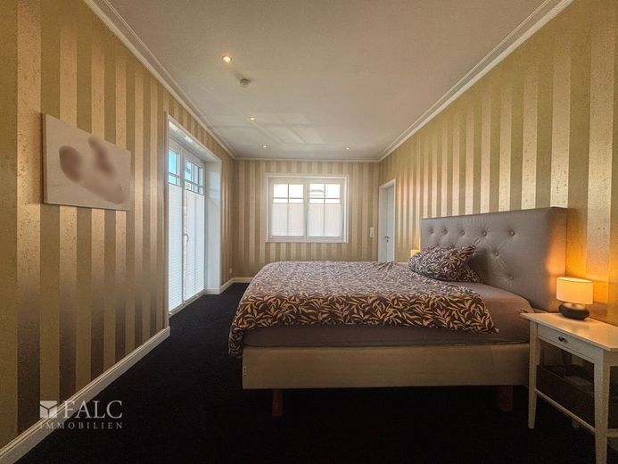 Moderne 3 -Zimmer-Wohnung mit Smart-Home, Dachterrasse &amp; hochwertiger Ausstattung – Schlafzimmer