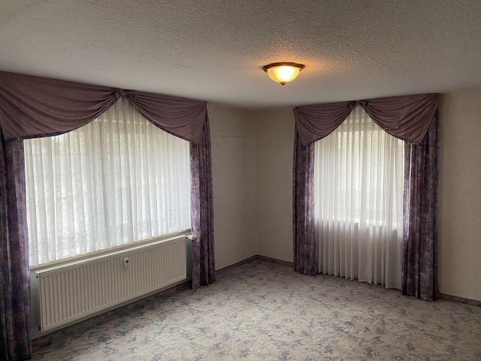 Mehrfamilienhaus in Kleinsendelbach – Schlafzimmer