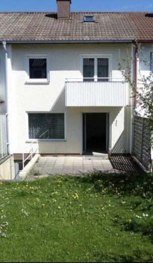 Casa a schiera centrale soleggiata con giardino, balcone e molto potenziale a Waltenhofen-Rauns – Foto 1