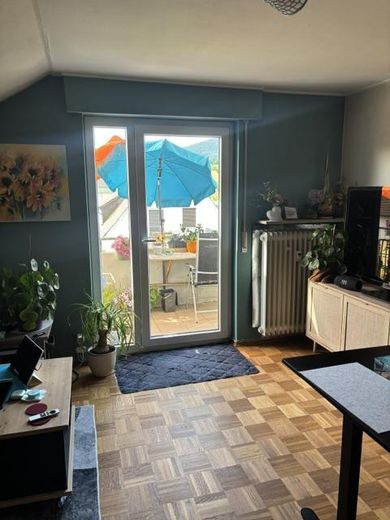 2 Zimmer Dachgeschoßwohnung mit Weitblick – Balkon vom Wohnzimmer aus