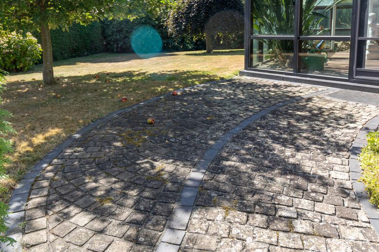 bungalow dal design moderno – Garten auf der Südseite