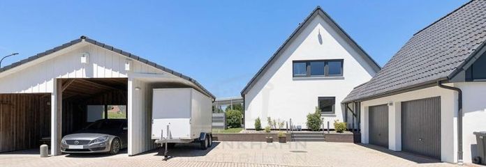 Live close to nature, enjoy city living: Modern detached house with garden near Kiel