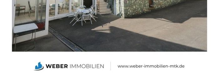 Hof mit Wintergarten Bild 1
