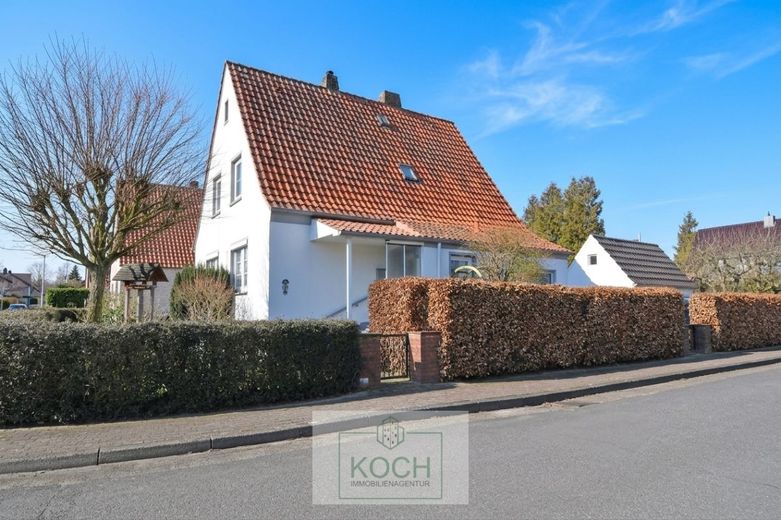 Größtenteils modernisiertes Einfamilienhaus in ruhiger Lage von Langen – Ansicht-Seite