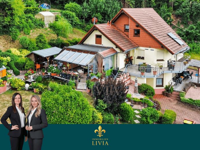 Exklusives Einfamilienhaus mit Gartenparadies, Garage und Einliegerwohnung – Foto 1