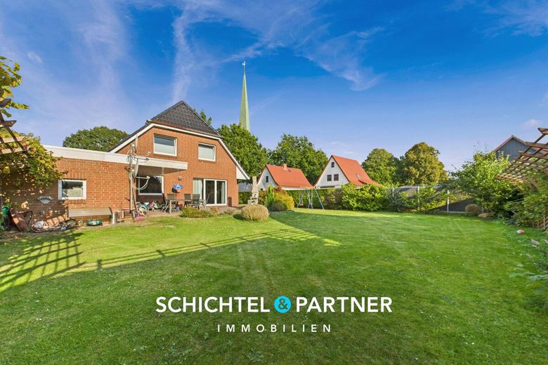 Surheide | Schickes Einfamilienhaus mit Terrasse, Garage und großem Garten – S&amp;P | Garten