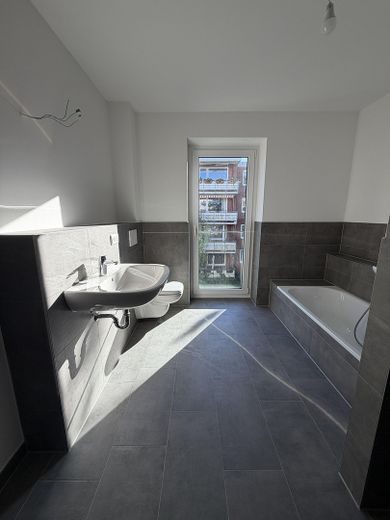 Eerste bewoning nieuwbouw – Exclusieve 4-kamerwoning met westloggia in Kaltenkirchen – Badezimmer 1