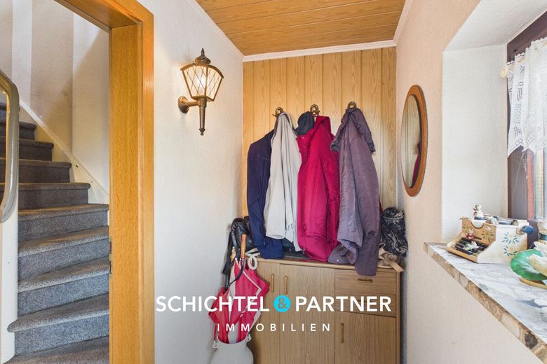Hambergen | Freistehendes Einfamilienhaus mit Kamin und großem Grundstück – S&amp;P | Eingangsbereich