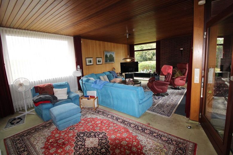 Individueller Flachdach-Bungalow mit Doppelgarage &amp; Parkähnlichem Grundstück in Schiffdorf-Sellstedt – 13 - Wohnzimmer