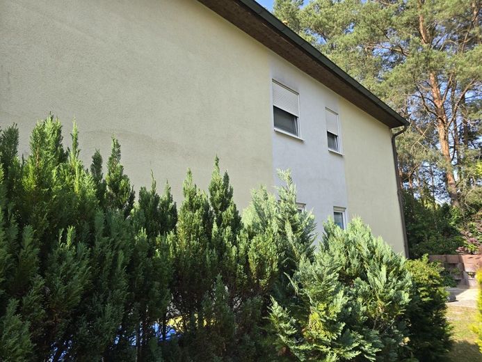 Vollvermietetes Mehrfamilienhaus mit 3 Wohneinheiten in Borkheide – Seitenansicht