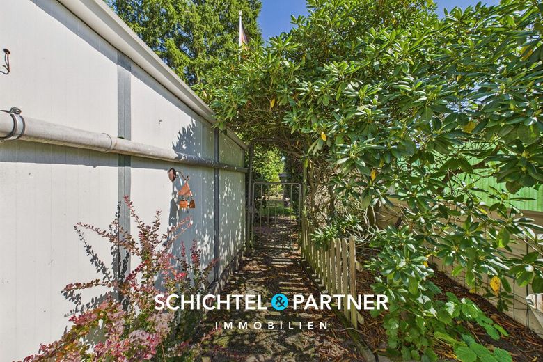 Rablinghausen | Attraktives 5-Parteienhaus mit Doppelgarage &amp; guter Rendite – S&amp;P | Eingang Garten