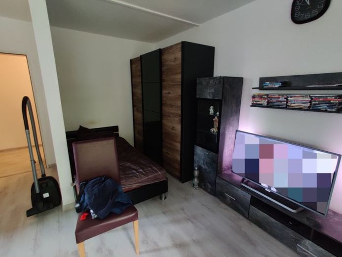Vermietete zentrale 1-Zimmer-Wohnung 
mit Tiefgaragenstellplatz in Gütersloh – Foto 1