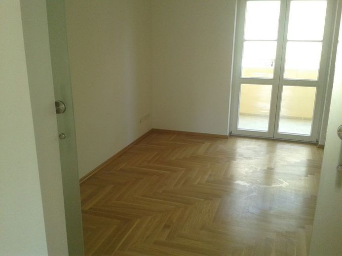 Schlafzimmer mit Balkon