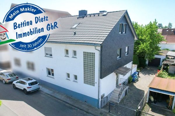 DIETZ: Gut geschnittenes 2-Familienhaus mit Garten, Garage und Nebengebäude in Babenhausen Langstadt