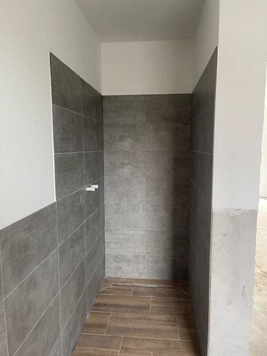 Moderne Penthousewohnung - Ein Wohntraum über den Dächern von Twistringen – Dusche