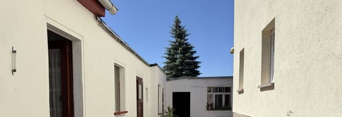 Wohnhaus mit vermieteter Einliegerwohnung Werkstatt, Nebengelass und Garten in Breitenhagen