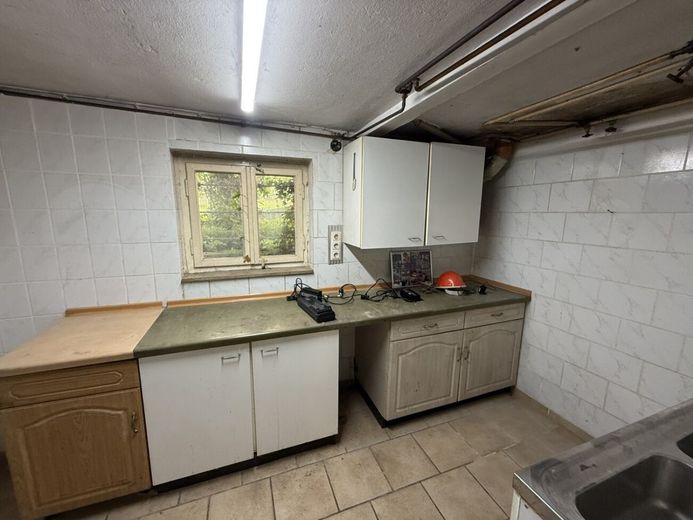 Vielseitiges Ein- bis Zweifamilienhaus mit großzügigem Grundstück in Volmerdingsen – Keller