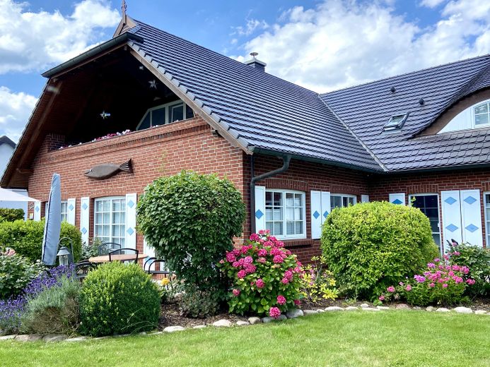 Bodden ile Baltık Denizi arasında – Fewo und Garten