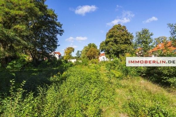 IMMOBERLIN.DE - Wassergrundstück! Exzellentes teilbares Bauland in idyllischer Seelage am Großen Zug