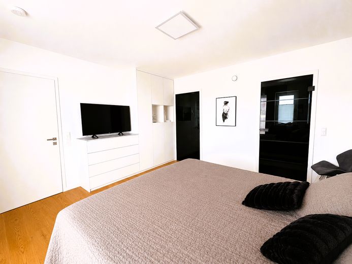 Esclusiva casa unifamiliare KFW 40+ con appartamento indipendente e ampio giardino – Schlafzimmer