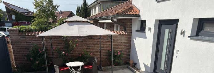 Kleines und modernes Häuschen für Single oder Pendler – Terrassen-/Eingangsbereich