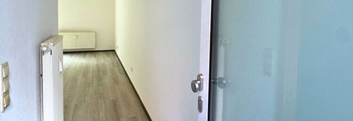 Renovierte 1-ZKB-Wohnung mit Stellplatz + Kellerraum
