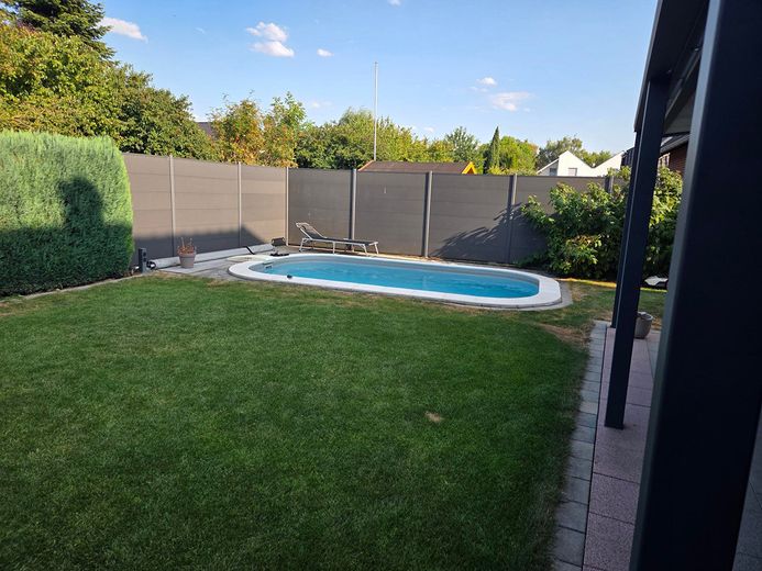 Spacious detached house with fireplace, sauna, garage and heated pool in the garden – Photo 3