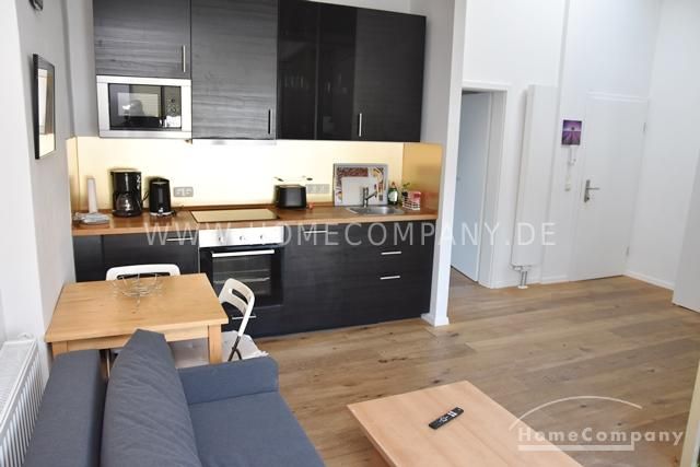 Zentrum, Modern möblierte DG-Wohnung mit Dachterrasse und offener Küche in zentraler aber ruhiger Lage – c329e1052546fc7463fc8f9cacd0ac6038ce5577.jpg